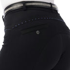 Black pants with a decorative belt on a white background