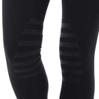 Black leggings with striped pattern on a white background