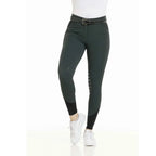 Dark green leggings worn by a person on a white background