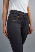 Dark gray riding pants with 'Harcour' branding on a gray background