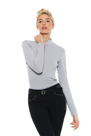 Woman wearing a gray long-sleeve top and black pants on a white background