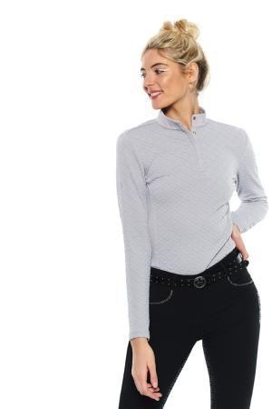 Woman wearing a gray long-sleeve shirt and black pants on a white background