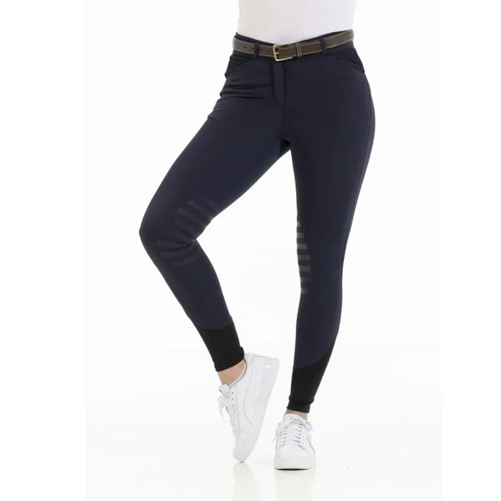 Black riding pants with a belt on a white background