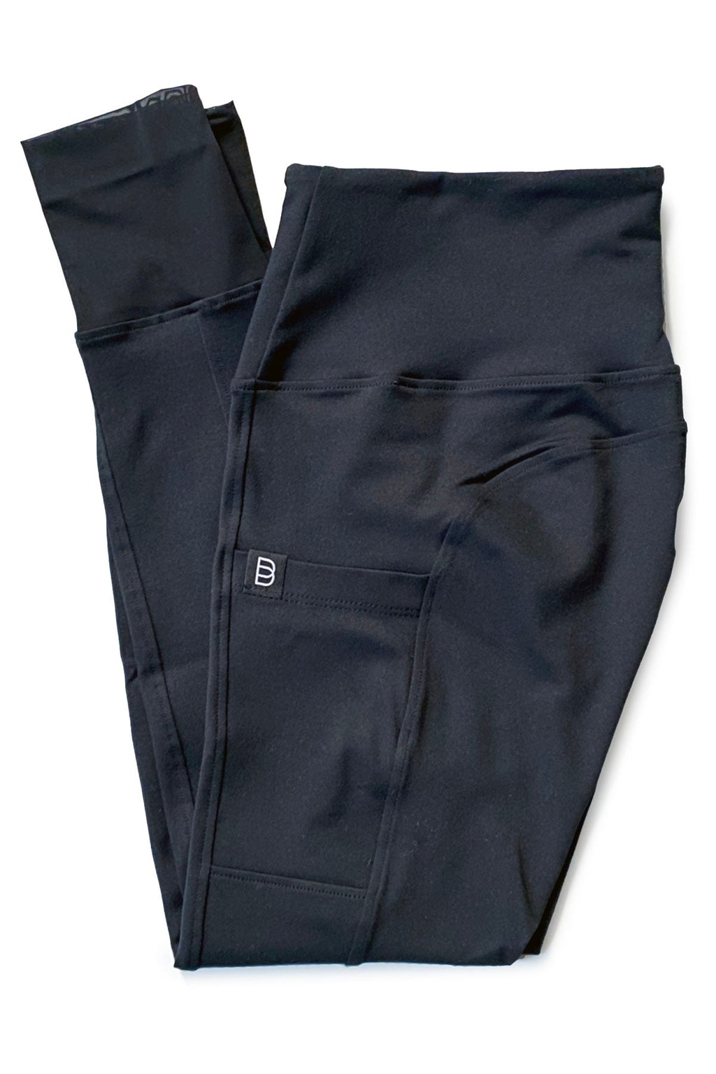 Dark blue equestrian riding pants with a brand logo on a white background