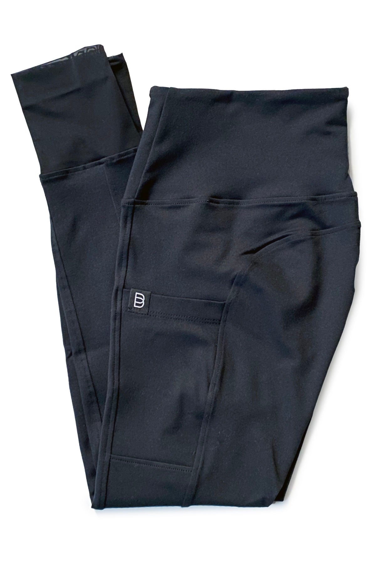 Dark blue equestrian riding pants with a brand logo on a white background