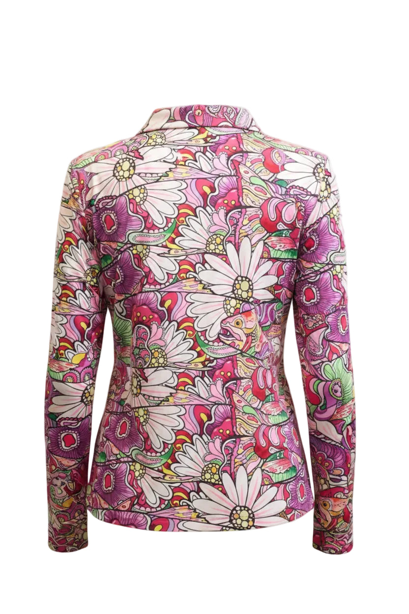 Woman wearing a colorful floral patterned jacket on a white background