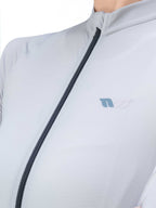 Light gray jacket with a zipper and brand logo on a white background