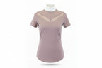 mauve top with a white collar 