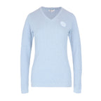 Light blue sweater with a small white logo on a white background