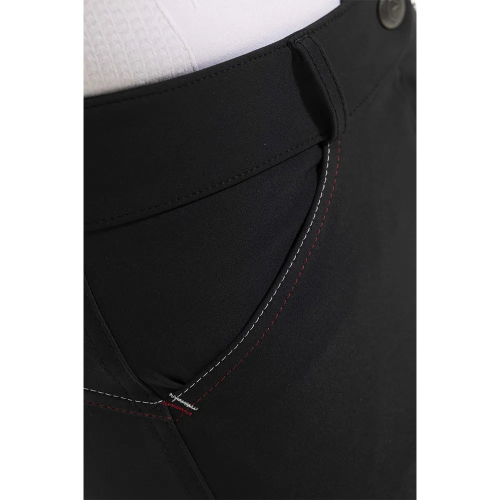 Close-up of black pants with a white background